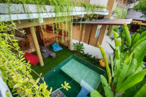Гостиница Kuta Suci Guest House  Kuta